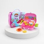 Pink kids portable kitchen cooking set and pretend play briefcase packed with colorful play food and utensils. This educational toy easily folds into a compact suitcase for mess-free storage and travel.